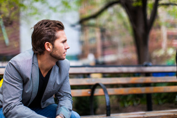 istock Young man in New York City 872601246