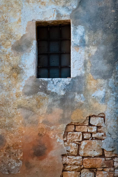 istock Broken wall of old house. 872601566