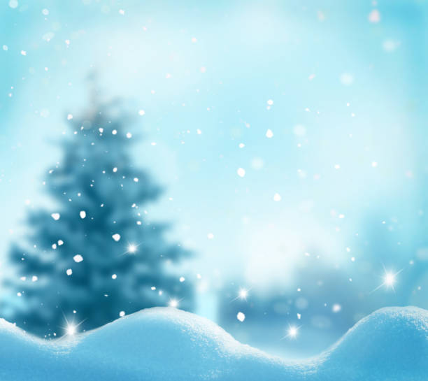 istock Christmas background with snow and blurred bokeh.Winter landscape 872604866