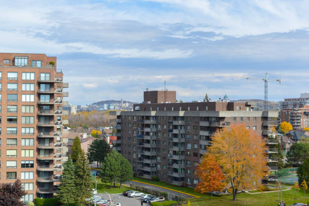 istock Modern condo buildings with huge windows in fall 872611188