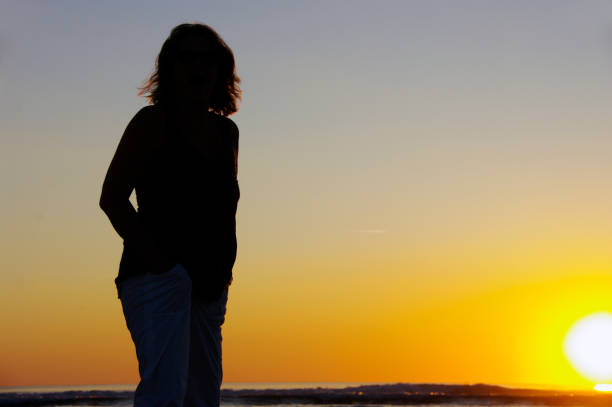 istock Woman in silhouette 872618188