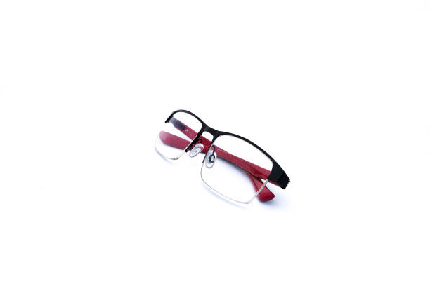 istock Pair of red and black folded spectacles, on white background 872618686