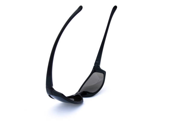istock Pair of cool, macho, masculine, black sun glasses, front view on white background 872618734
