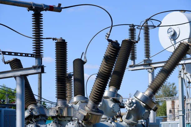 istock Isolators and transformers at the electrical substation. 872618796