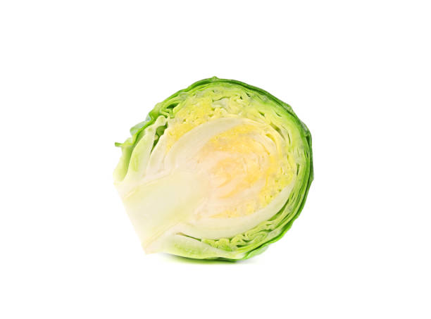 istock Brussels sprouts isolated on a white background. Pile of Brussels sprouts 872620670