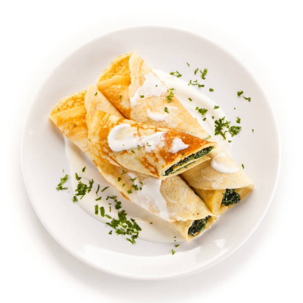 istock Crepes with spinach and cream 872621644