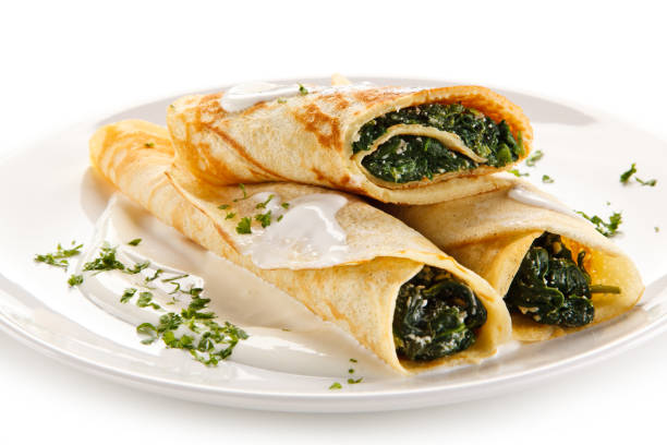istock Crepes with spinach and cream 872621760