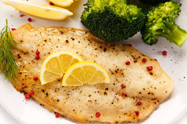 istock Fish dish - fish fillet and vegetables 872622422
