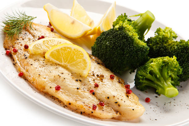 istock Fish dish - fish fillet and vegetables 872622516