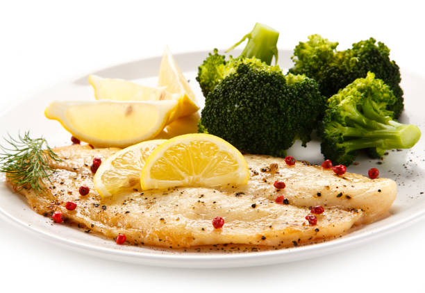 istock Fish dish - fish fillet and vegetables 872624614