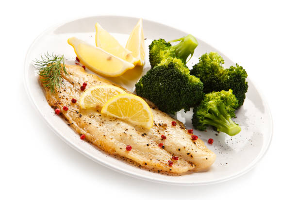 istock Fish dish - fish fillet and vegetables 872624632