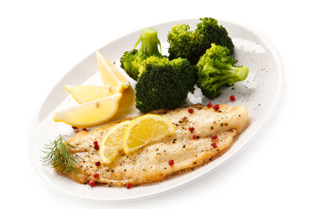 istock Fish dish - fish fillet and vegetables 872624676