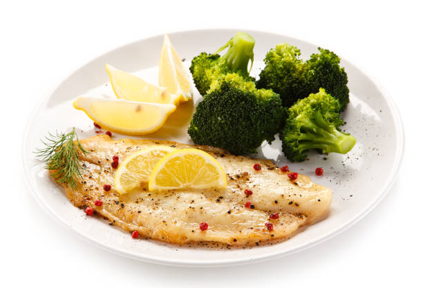 istock Fish dish - fish fillet and vegetables 872624736
