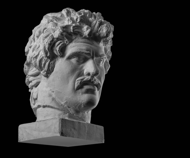 istock White plaster bust sculpture portrait of a young man with a mustache 872627882