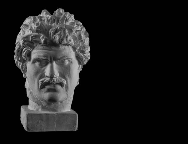 istock White plaster bust sculpture portrait of a young man with a mustache 872628018