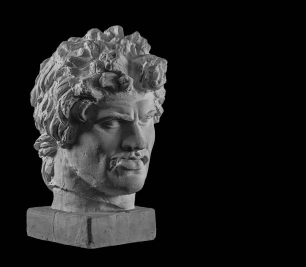 istock White plaster bust sculpture portrait of a young man with a mustache 872628206