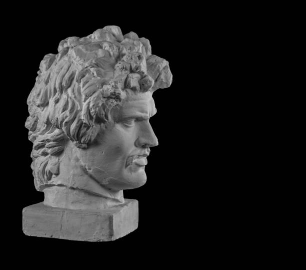 istock White plaster bust sculpture portrait of a young man with a mustache 872628452