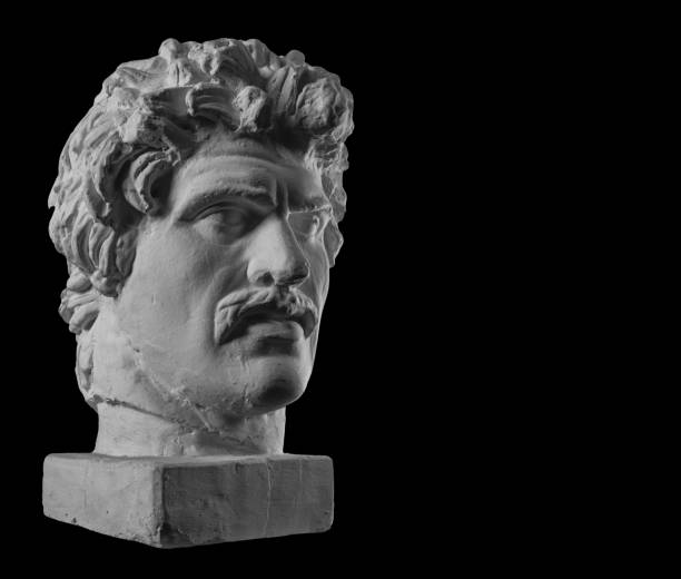 White plaster bust sculpture portrait of a young man with a mustache