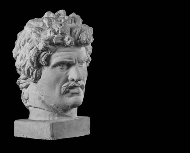 istock White plaster bust sculpture portrait of a young man with a mustache 872630792