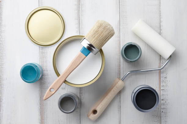 istock Different painting supplies on white wooden table 872630844
