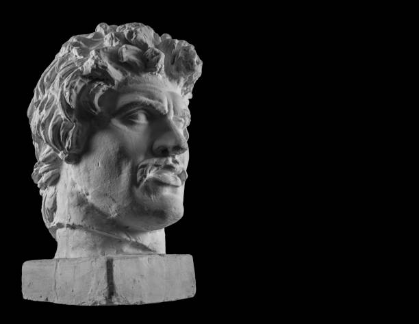 istock White plaster bust sculpture portrait of a young man with a mustache 872631472