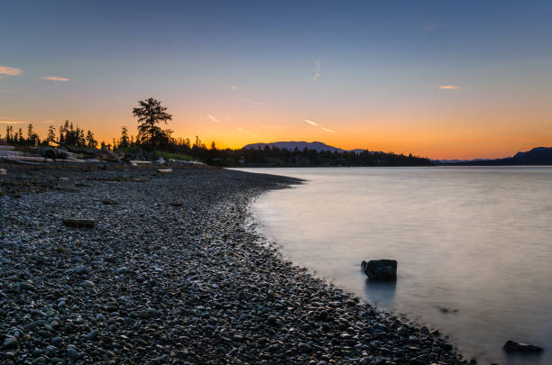 istock Deserted Pebble Beach and Clear Sky at Dusk. 872633250