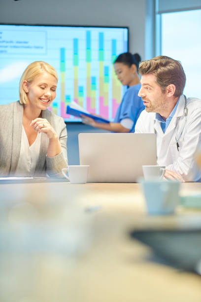 istock business and medicine meeting 872639032
