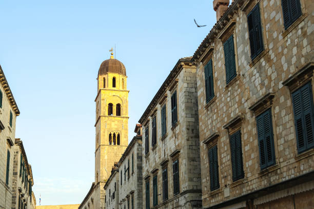 istock Bell tower of Franciscan church and monast 872641982