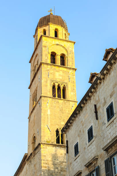 istock Bell tower of Franciscan church and monast 872641996