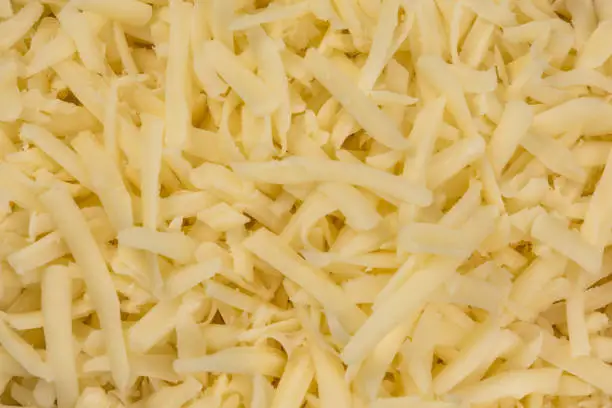 a closeup of shredded Mozzarella