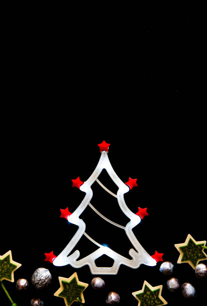 istock Christmas tree shaped led light tube on black 872656042