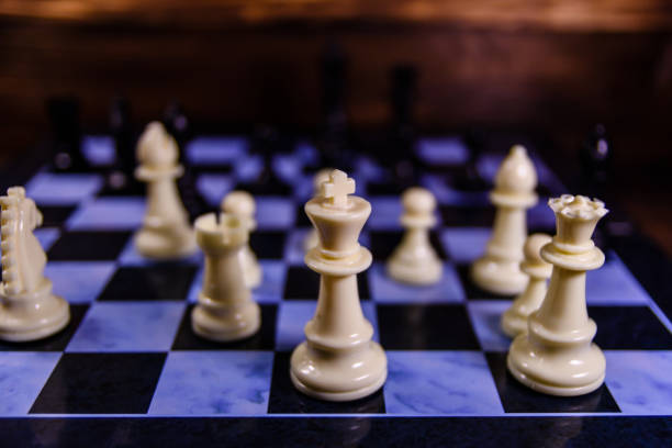 istock Composition of the chess pieces on a chess board 872663482