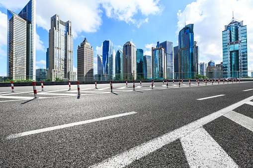 Shanghai Lujiazui financial district commercial buildings and asphalt road scenery,China