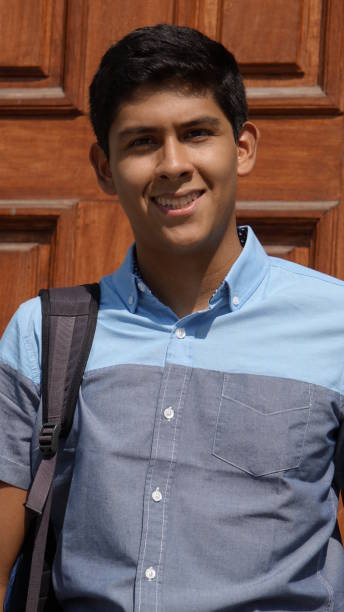 istock Smiling Male Teen Student 872683226