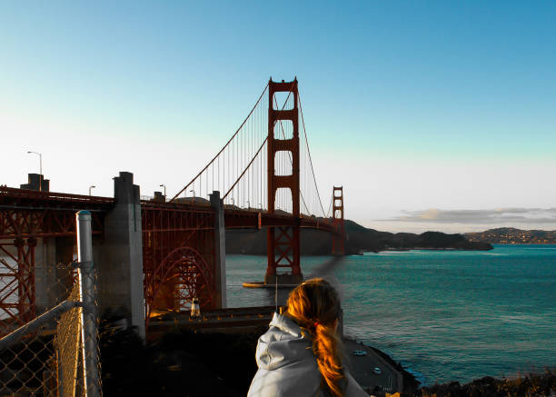 istock Woman Cycling Over Golden Gate 872694326