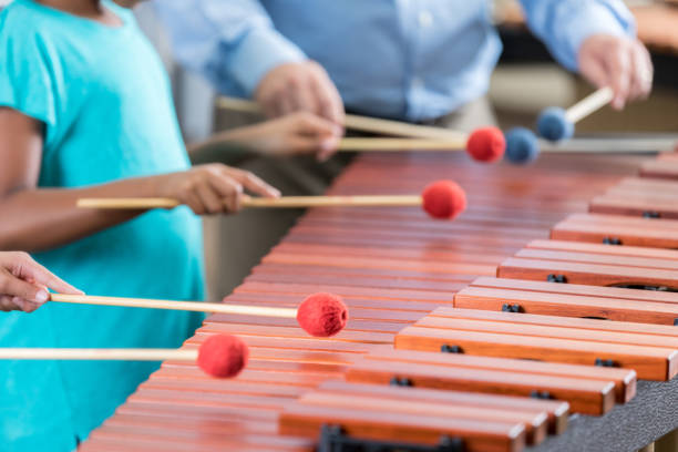 istock Unrecognizable students and teacher play the xylophone together 872697996