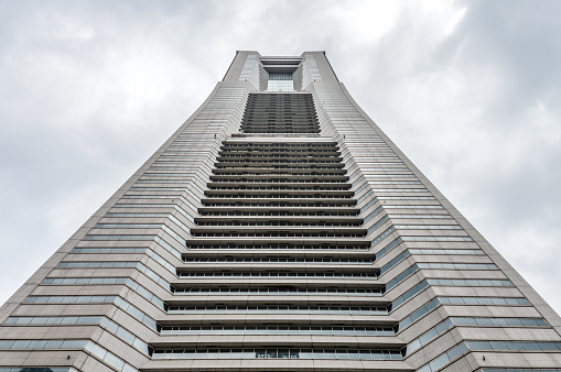 The tallest building in Yokohama, the Landmark Tower is a defining feature of the Minato Mirai waterfront. Photo taken during an overcast day.