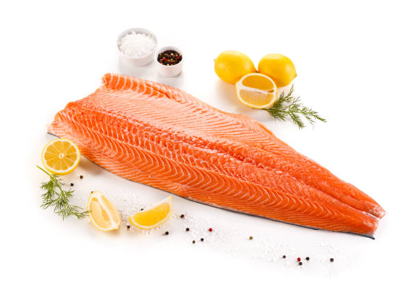 istock Fresh raw salmon fillet on white background 872704770