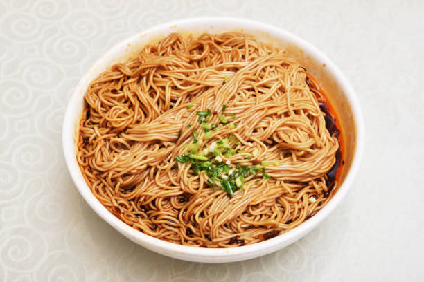 istock Noodles mixed with scallion, oil and soy sauce 872704832