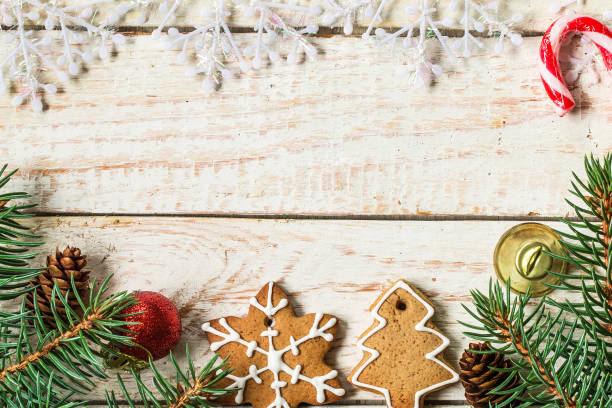 istock Christmas background with gingerbread cookies and fir tree 872714468