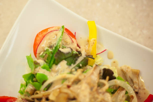 istock Healthy mushroom salad with cream dressing 872717248