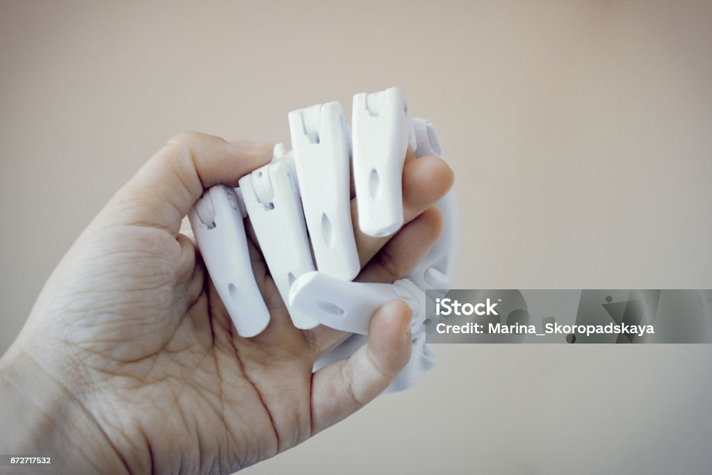 Robot hand fingers from plastic Robot hand fingers from plastic close-up conceptual handshake 3D Printing Stock Photo