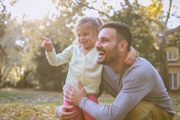 istock Smiling father spending time with daughter. 872728972