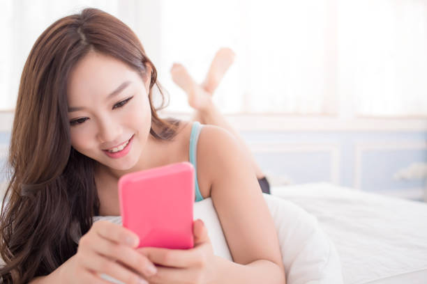 istock woman use phone 872732376