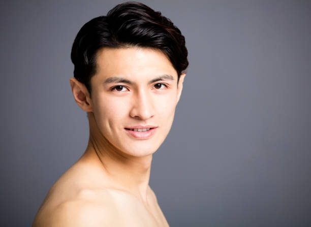 istock closeup asian Handsome young men face 872738322