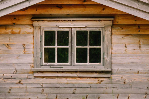 istock Old vintage dark wooden window, rural design concept. 872745328