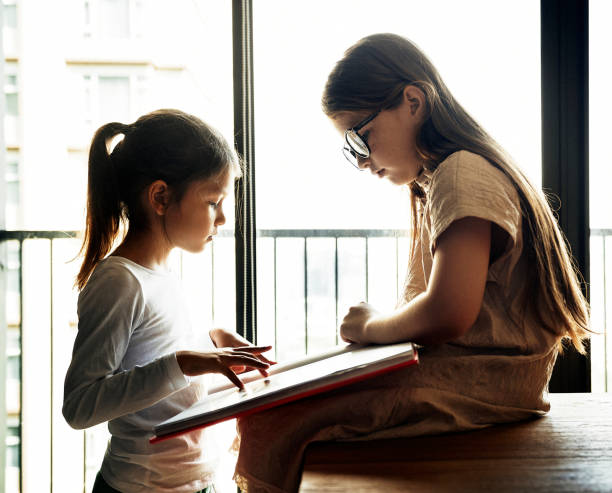 istock Girl friends playing together 872748968