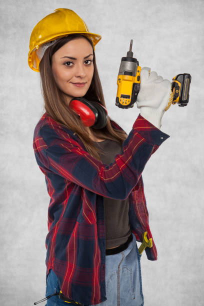 istock Female worker, handyman at home 872758166