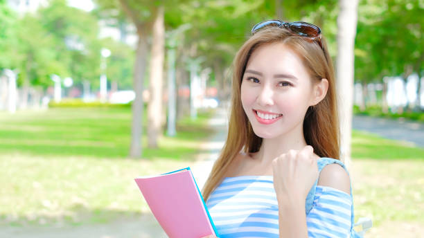 istock beauty woman student 872758200
