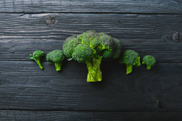 istock Broccoli. On a wooden background. Top view. Free space for your text. 872758214